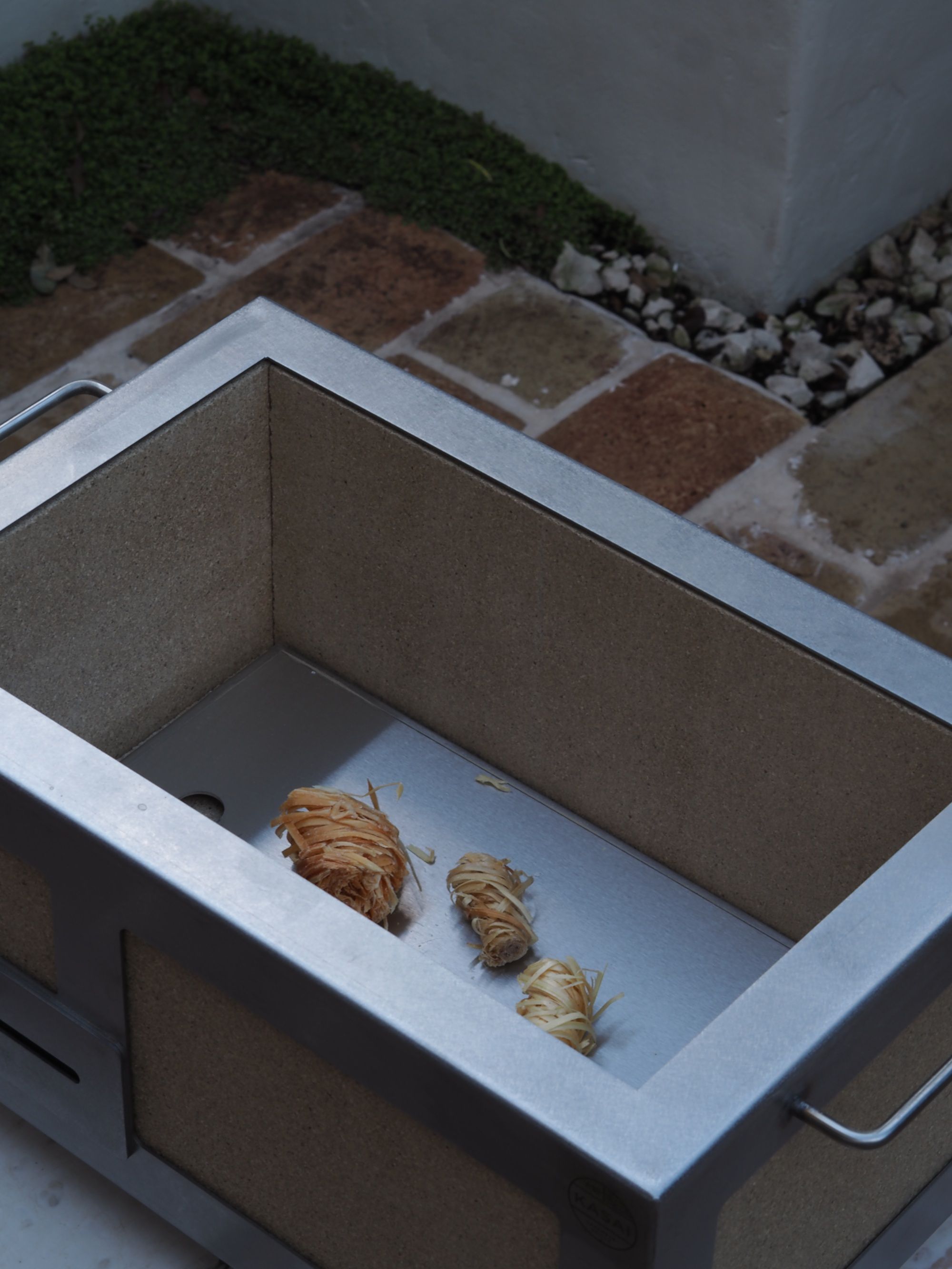 a kasai bbq grill in a garden 