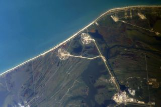A photograph taken by Russian cosmonaut Ivan Vagner from the International Space Station shows Kennedy Space Center's Launch Complex 39, which includes the pad SpaceX's Demo-2 mission will launch from, as seen on May 29, 2020.