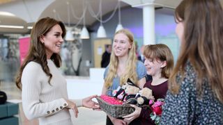 Catherine, Princess of Wales talks to students during a visit to Nottingham Trent University