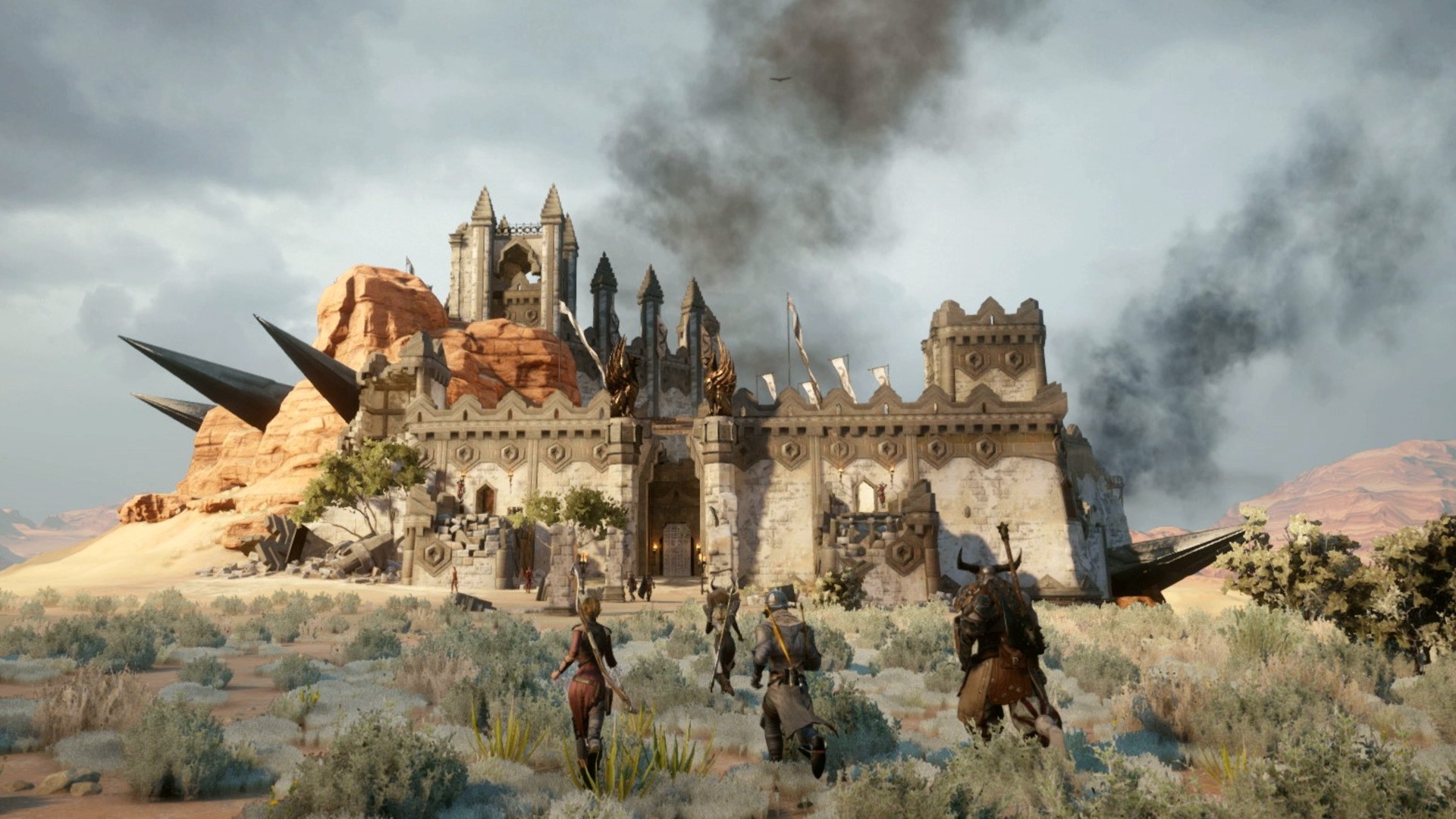 Dragon Age Inquisition screenshot showing the party running towards a keep in The Western Approach open-world location