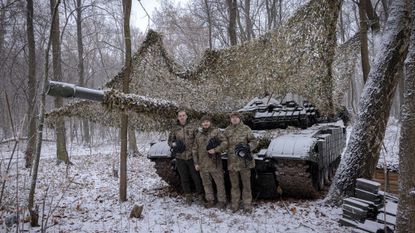 Ukrainian soldiers prepare to enter Russia's Kursk region