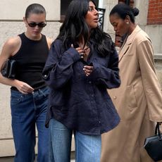 Denim and shoe combos are shown in a collage of British women's denim and shoe outfit ideas. 