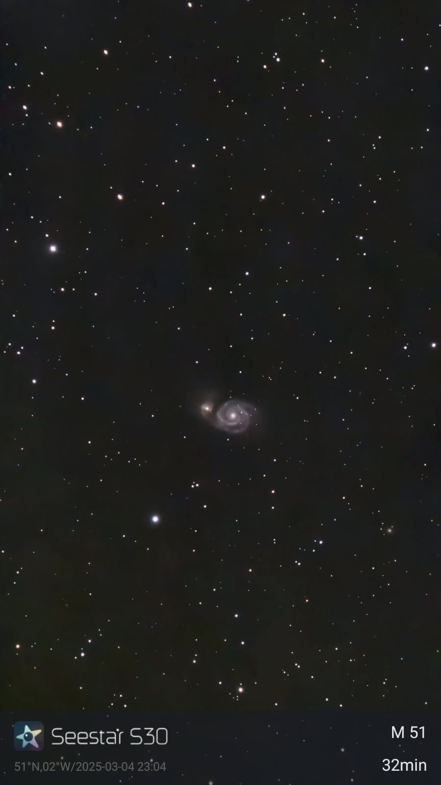 Astro shot of the Whirlpool Galaxy and NGC 5195 taken with the ZWO Seestar S30 smart telescope.