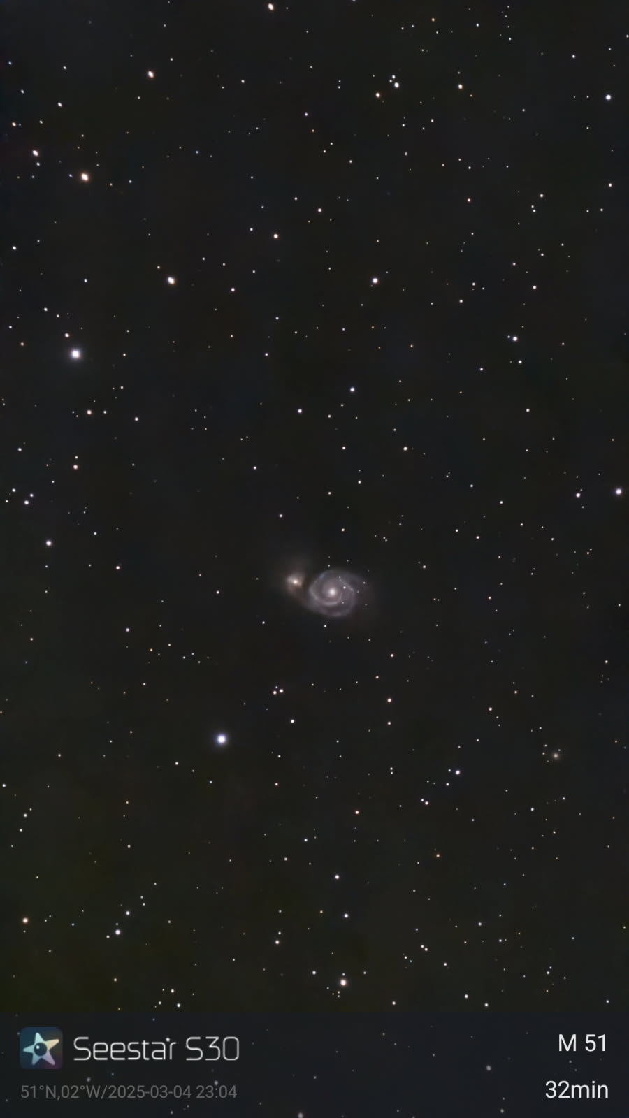 Astro shot of the Whirlpool Galaxy and NGC 5195 taken with the ZWO Seestar S30 smart telescope.