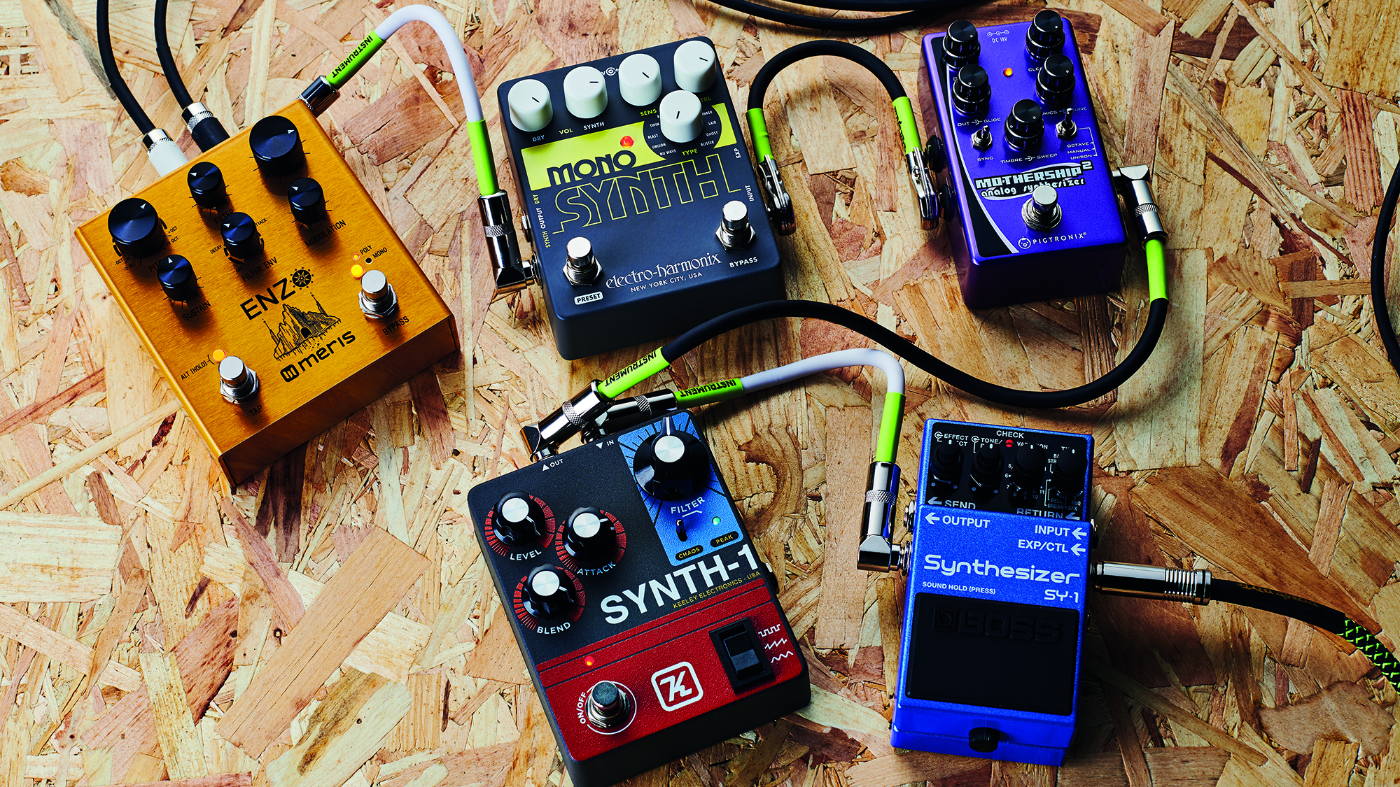 A group of guitar synth pedals, including (clockwise from left) a Meris Enzo, Electro- Harmonix Mono Synth, Pigtronix Mothership V2, Boss SY-1 and a Keeley Synth-1, taken on July 29, 2019.