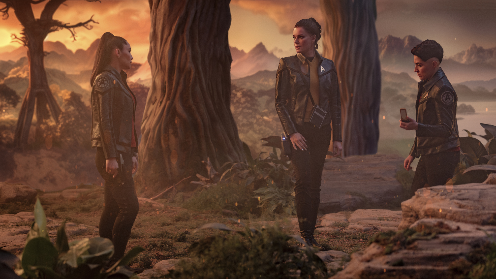 (L-R): Rebecca Romijn as Una, Christina Chong as La’an Noonien-Singh, and Melissa Navia as Erica Ortegas in season 4, episode 1, of Star Trek: Strange New Worlds.