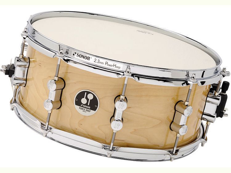 The matching wood snare is 6" deep - a good compromise for snappiness with