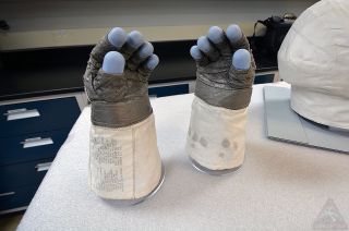 Apollo 11 commander Neil Armstrong's extravehicular activity (EVA) gloves worn during humanity's first moonwalk, as seen on Wednesday, Sept. 12, 2018 in the conservation hangar at the National Air and Space Museum’s northern Virginia annex, the Steven F. Udvar-Hazy Center.