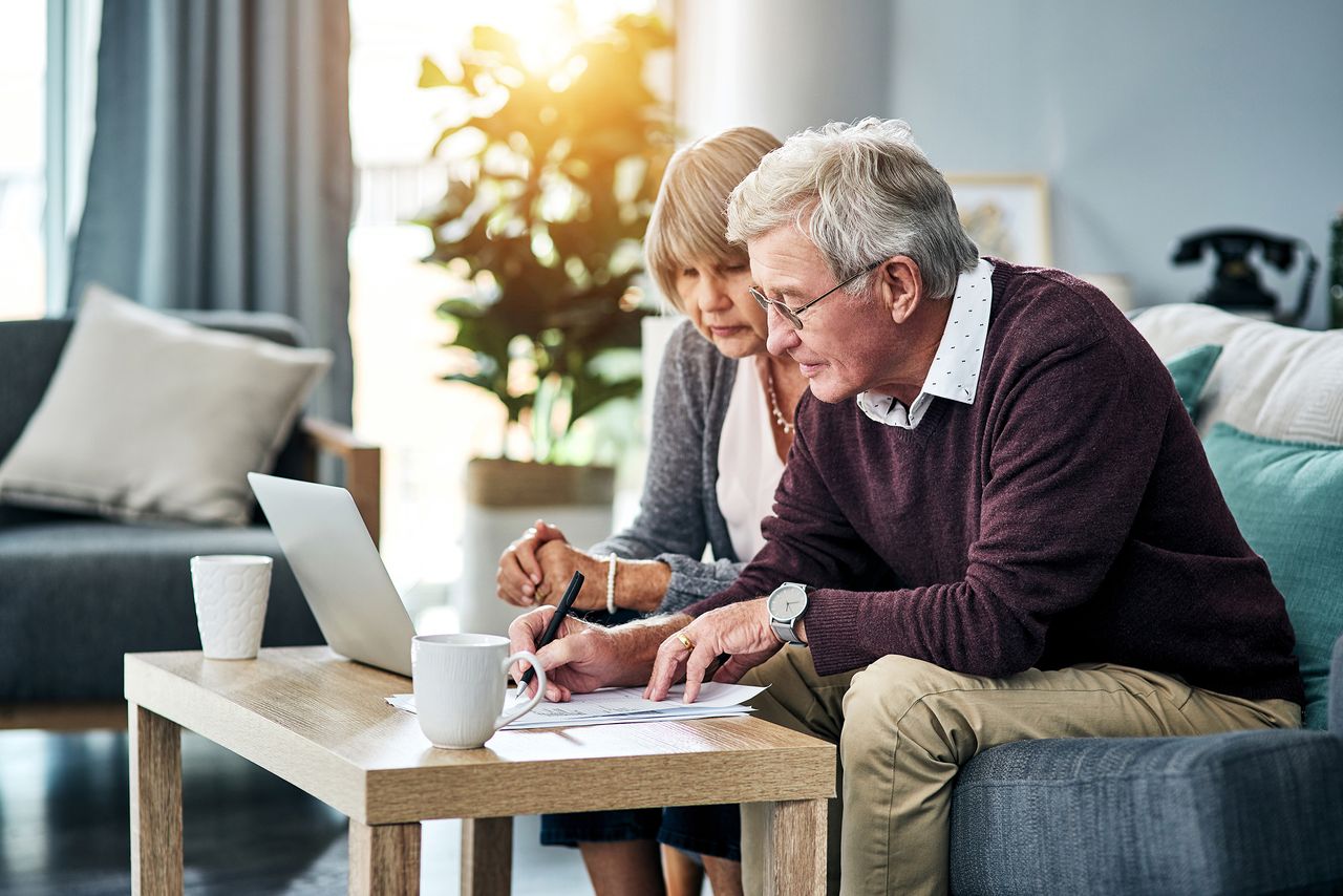 Retired couple with laptop