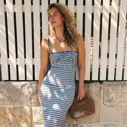 woman wearing a gingham dress