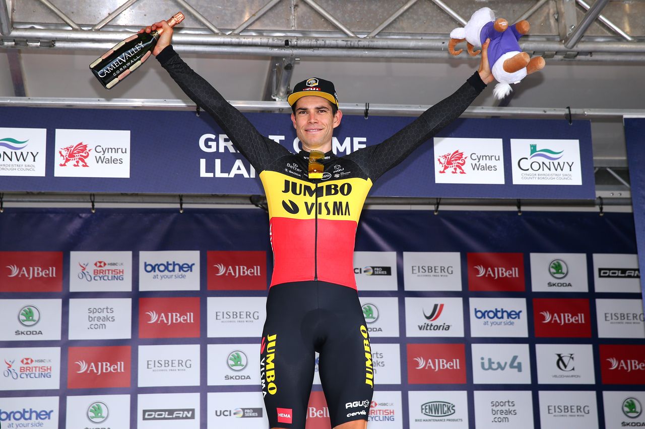 Wout van Aert on the Tour of Britain 2021 podium after winning stage four on the summit finish of the Great Orme in Llandudno, Wales