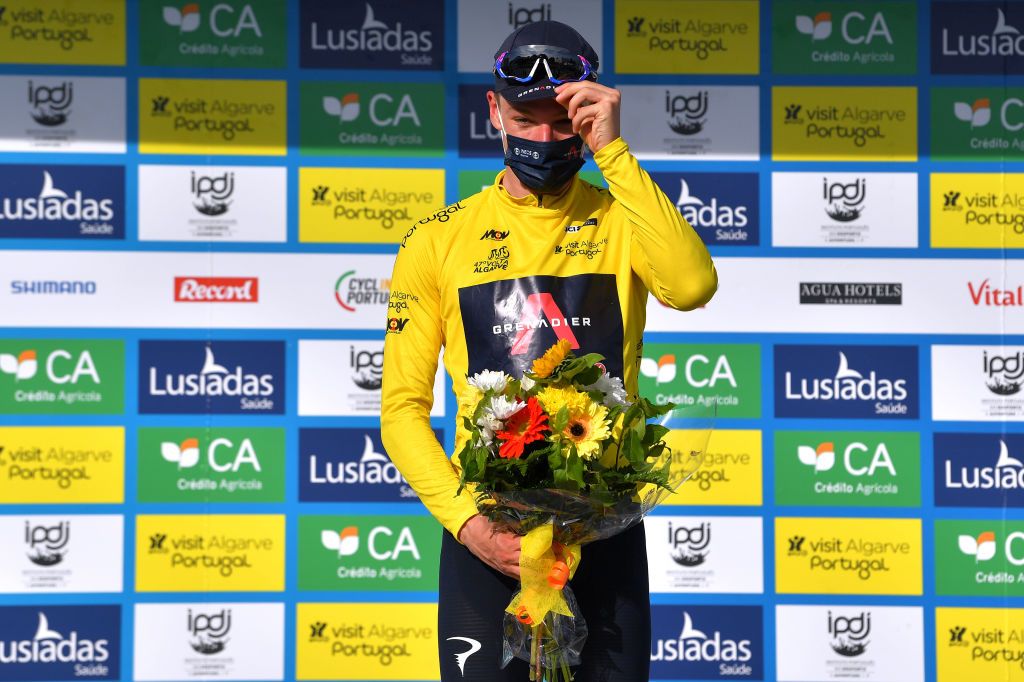 TAVIRA PORTUGAL MAY 07 Ethan Hayter of United Kingdom and Team INEOS Grenadiers Yellow Leader Jersey celebrates at podium during the 47th Volta Ao Algarve 2021 Stage 3 a 2031km stage from Faro to Tavira Mask Covid Safety Measures Flowers VoltAlgarve VAlgarve2021 on May 07 2021 in Tavira Portugal Photo by Luc ClaessenGetty Images