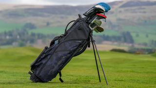 The striking TaylorMade flextech lite bag showing off its stealthy design on the golf course