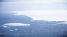 Iceberg A68a as it floats past South Georgia Island.