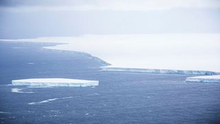 Iceberg A68a as it floats past South Georgia Island.