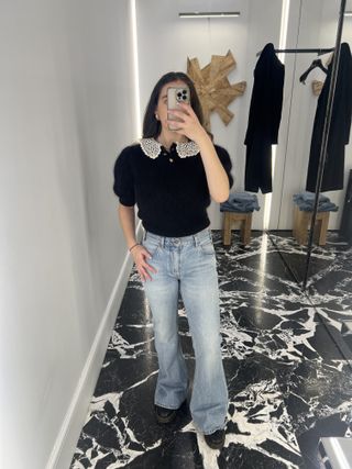 An image ofBest Knockoff Luxury Clothing
 UK SEO Writer Ava Gilchrist wearing the Celine flared jeans Kendrick Lamar wore during his Super Bowl performance.