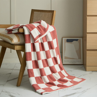 6. YIRUIO Checkerboard Grid Throw Blanket | $59.99 at Amazon