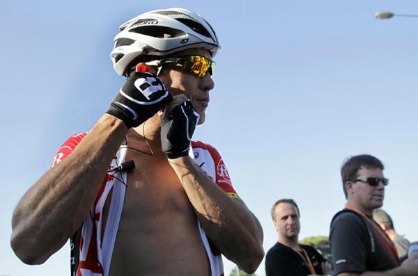 Robbie McEwen readies his race radio.