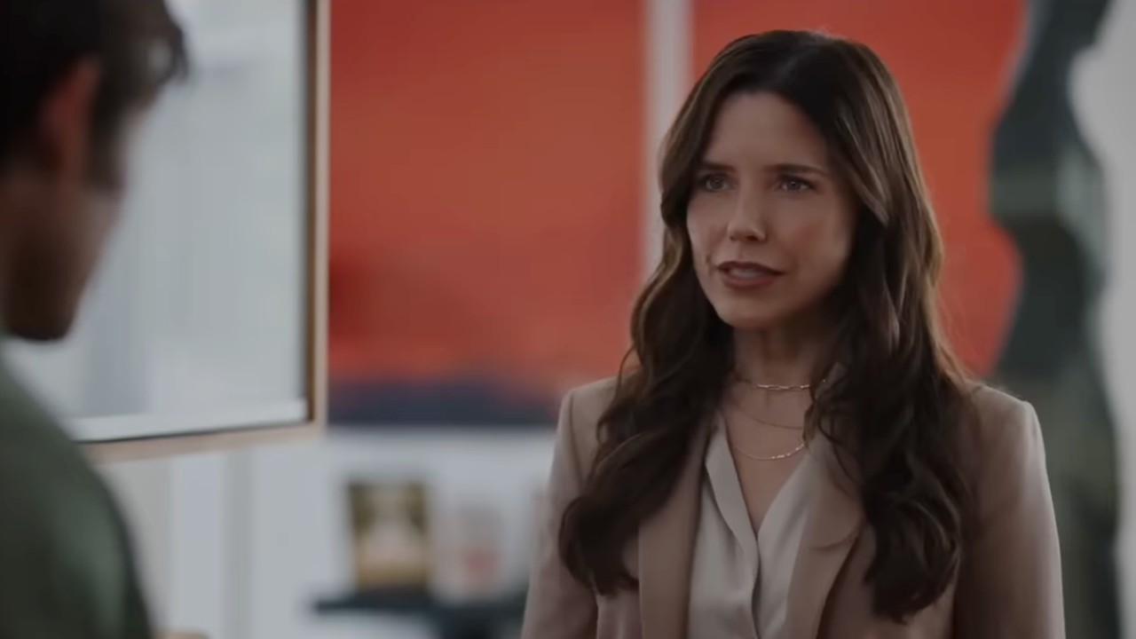 Sophia Bush looking at Chris Carmack in The Stranger in My Home.