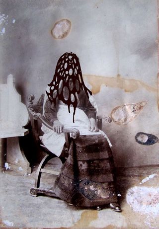 Black and white image of a woman sitting in a chair, with a digitally-designed net over her head