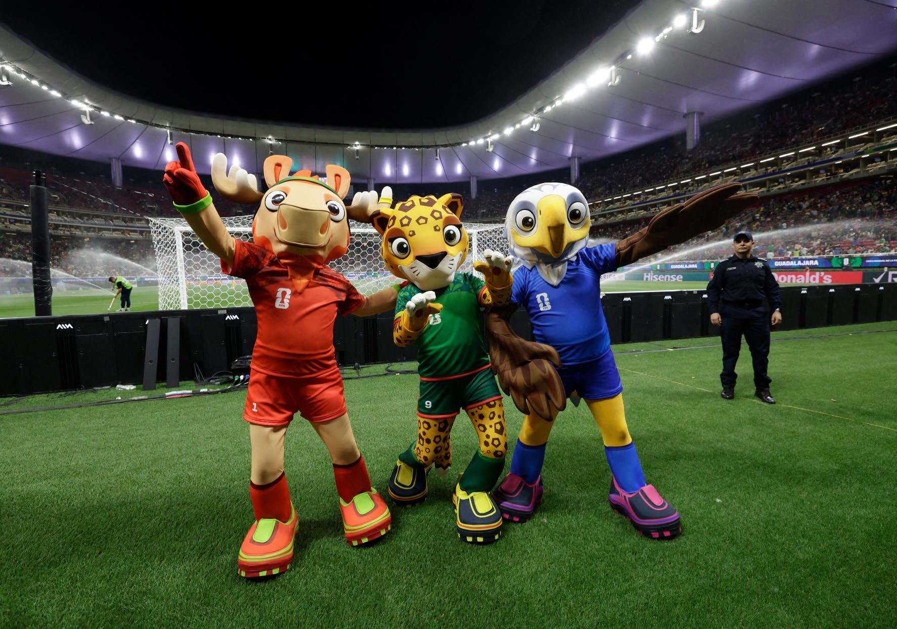 Mascots of the World Cup Maple the Moose (L), Zayu the Jaguar (C) and Clutch the Bald Eagle pose for a picture during the 2026 FIFA World Cup qualifiers semi-final playoff football match