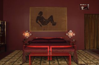 Dark red bedroom with bright red gloss bed frame