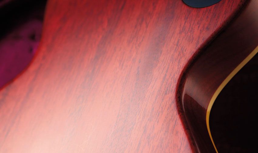 The UV-sensitive aniline dyes impart a pinkish cherry hue