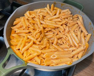 large portion of creamy tomato pasta in an always pan