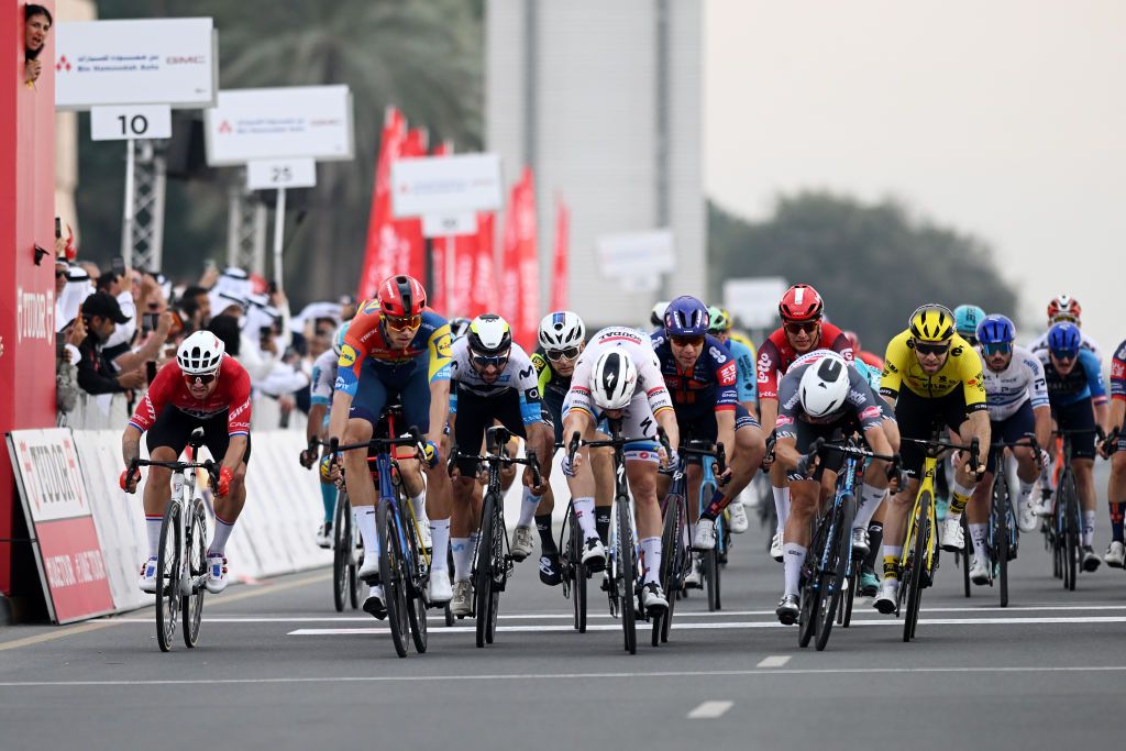 QIDFA UNITED ARAB EMIRATES FEBRUARY 20 LR Dylan Groenewegen of The Netherlands and Team Jayco AlUla Jonathan Milan of Italy and Team LidlTrek Tim Merlier of Belgium and Team Soudal QuickStep Fabio Jakobsen of The Netherlands and Team Picnic PostNL Jasper Philipsen of Belgium and Team AlpecinDeceuninck Daniel McLay of The United Kingdom and Team Visma Lease a Bike and Phil Bauhaus of Germany and Team Bahrain Victorious sprint at finish line during the 7th UAE Tour 2025 Stage 4 a 181km stage from Fujairah Qidfa Beach to Umm al Quwain UCIWWT on February 20 2025 in Fujairah Qidfa Beach United Arab Emirates Photo by Dario BelingheriGetty Images