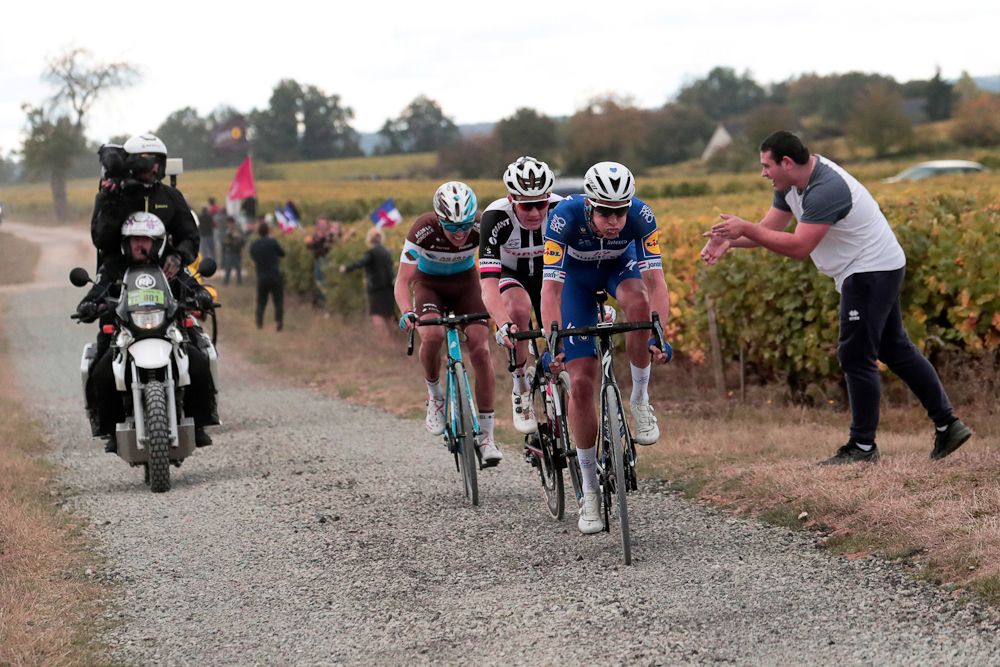 Niki Terpstra, Soren Kragh Andersen and Benoit Cosnefroy ride on the gravel at Paris-Tours