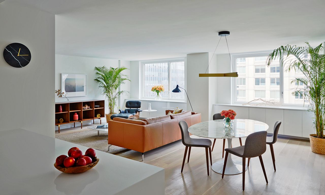 Living room with a couch and a glass table