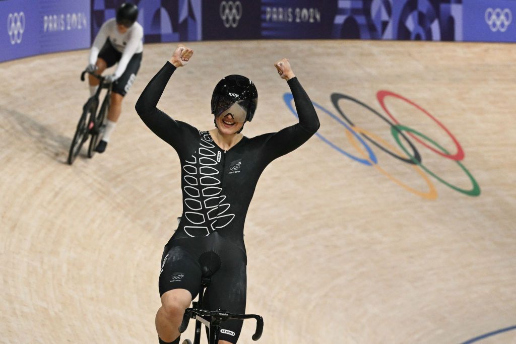 New Zealand's Ellesse Andrews celebrates after winning the women's track cycling sprint final race 2 for gold of the Paris 2024 Olympic Games at the Saint-Quentin-en-Yvelines National Velodrome in Montigny-le-Bretonneux, south-west of Paris, on August 11, 2024. (Photo by SEBASTIEN BOZON / AFP)