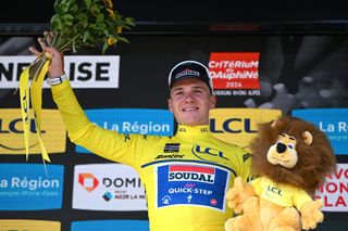 NEULISE FRANCE JUNE 05 Remco Evenepoel of Belgium and Team Soudal QuickStep celebrates at podium as Yellow Leader Jersey winner during the 76th Criterium du Dauphine 2024 Stage 4 a 344km individual time trial at stage from SaintGermainLaval to Neulise 552m UCIWT on June 05 2024 in Neulise France Photo by Dario BelingheriGetty Images