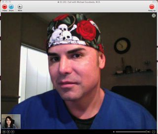 Escobedo talks with a former patient over video chat.