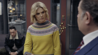 Dr Nikkie Alexander wearing a yellow cardigan in Silent Witness season 27