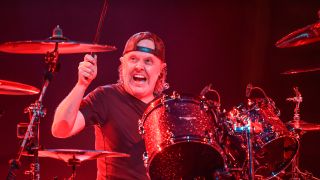 Lars Ulrich drumming on stage