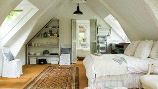 Loft bedroom with en suite in a 15th century converted mill