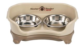 A beige-colored Neater Feeder cat food bowl