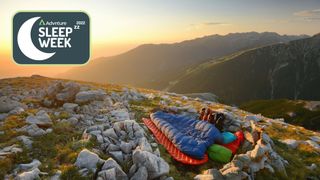 Sleeping bags on a rock at sunrise
