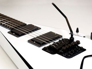 Twin EMGs? Check. Floyd Rose vibrato? Check. Heavy metal? Yes indeed.