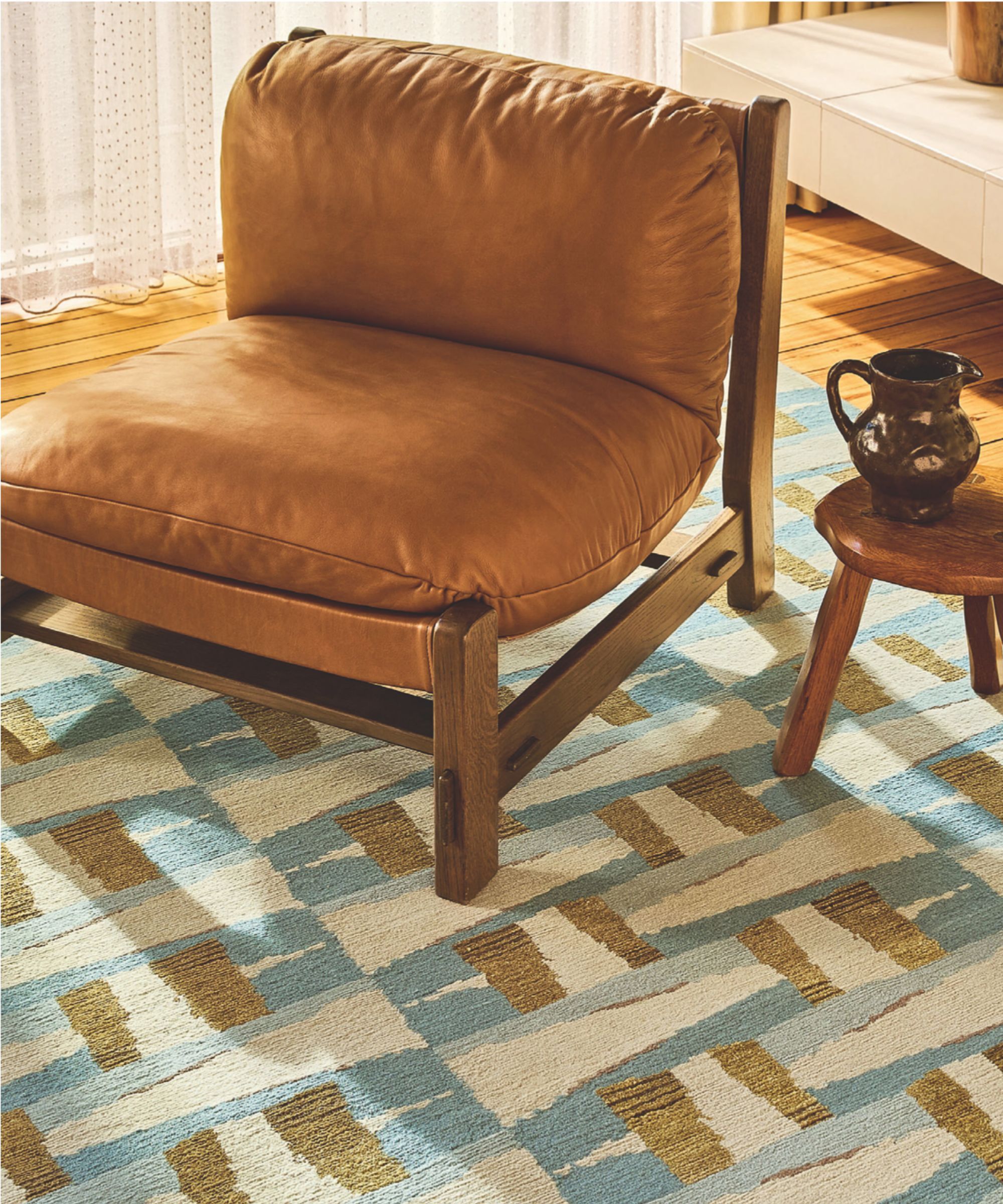 Blue and gold geometric print rug