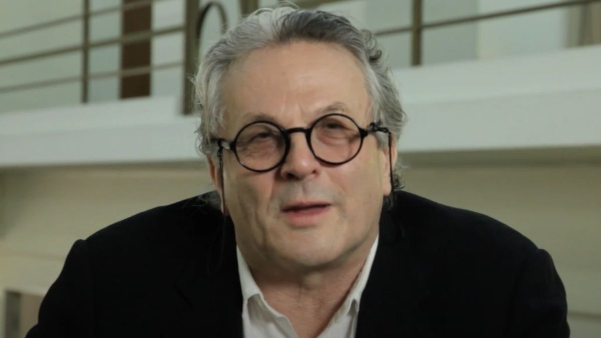 George Miller speaks during an interview