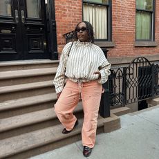 Editor standing on New York City stoop