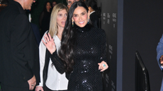 Demi Moore wears a long black sequin dress
