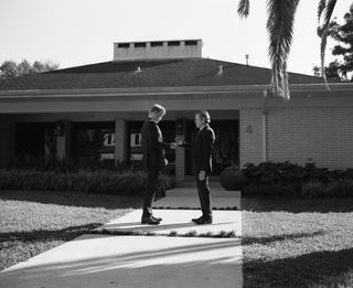 Film still from 'Kinds of Kindness' showing buildings and architecture