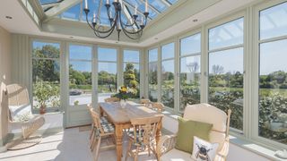 pale green conservatory interior ideas with chandelier