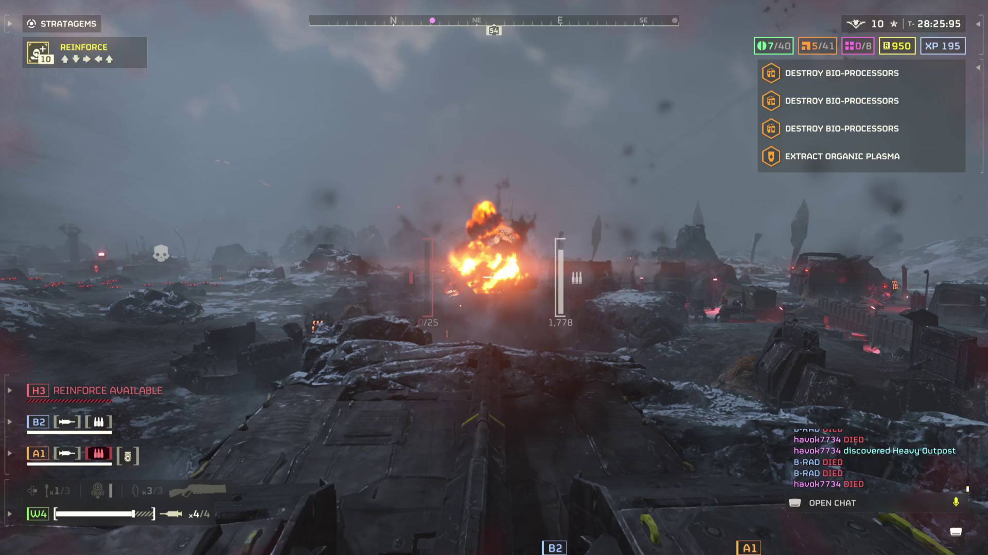 Helldivers 2 firing Bastion tank cannon at automaton fabricator and blowing it up