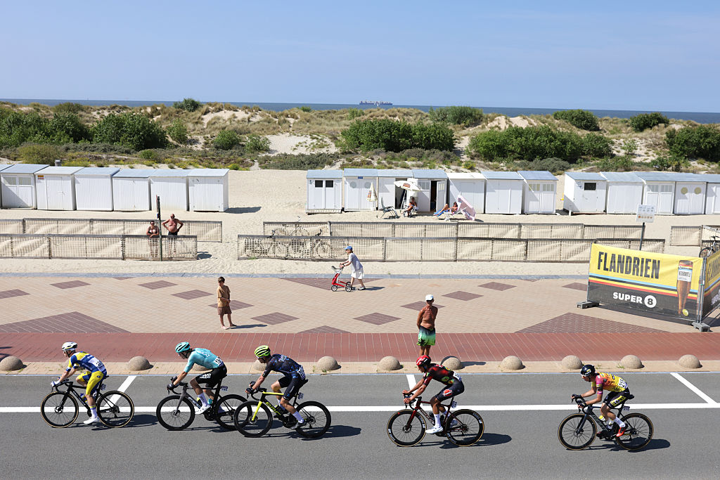 KNOKKE-HEIST, BELGIUM - JUNE 18: Dylan Vandenstorme of Belgium and Team Flanders - Baloise, Frits Biesterbos of Netherlands and Team BEAT Cycling Club, Victor Broex of Netherlands and Team Metec - SOLARWATT p/b Mantel, Yorben Lauryssen of Belgium and Team Pauwels Sauzen - Cibel Clementines and Gianni Marchand of Belgium and Team Tarteletto - Isorex compete in the breakaway during the 94th Baloise Belgium Tour 2025, Stage 1 a 197.6km Merelbeke-Melle to Knokke-Heist on June 18, 2025 in Merelbeke-Melle, Belgium. (Photo by Rhode Van Elsen/Getty Images)