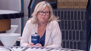 Angela with a bored look on her face.