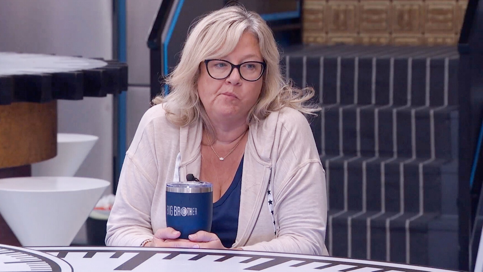 Angela with a bored look on her face. 